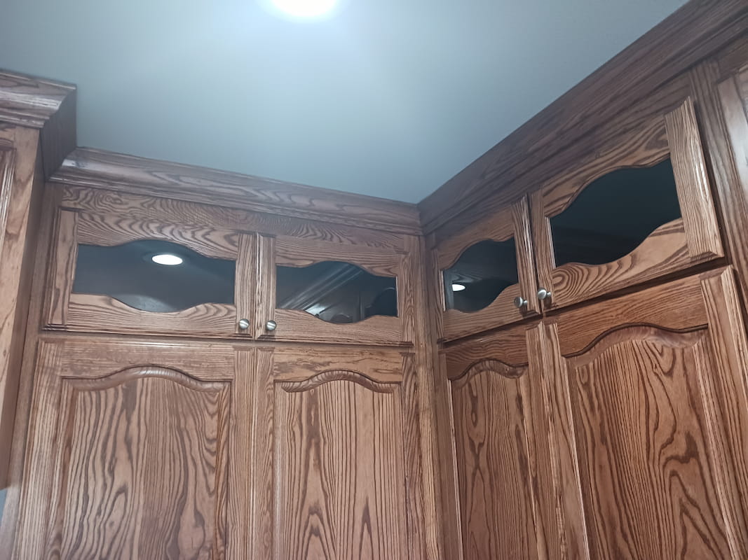 Custom cabinet glass installation by Artisan Glass Designs in DFW